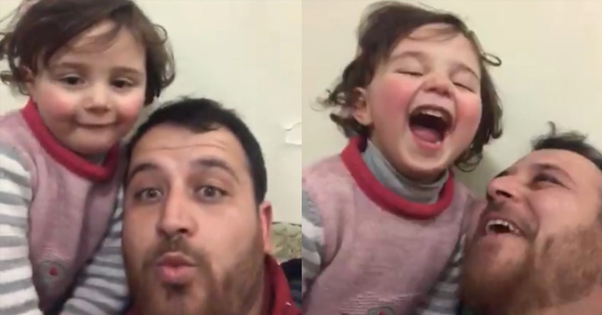 Heartbreaking Video Shows Syrian Father Teaching His 4-year-old Girl to Laugh at Bombs as a Coping Mechanism